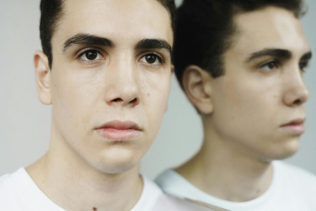 The Origin of "Kaizen" 2 a man with a reflection of his own self. Reflecting the battle within yourself